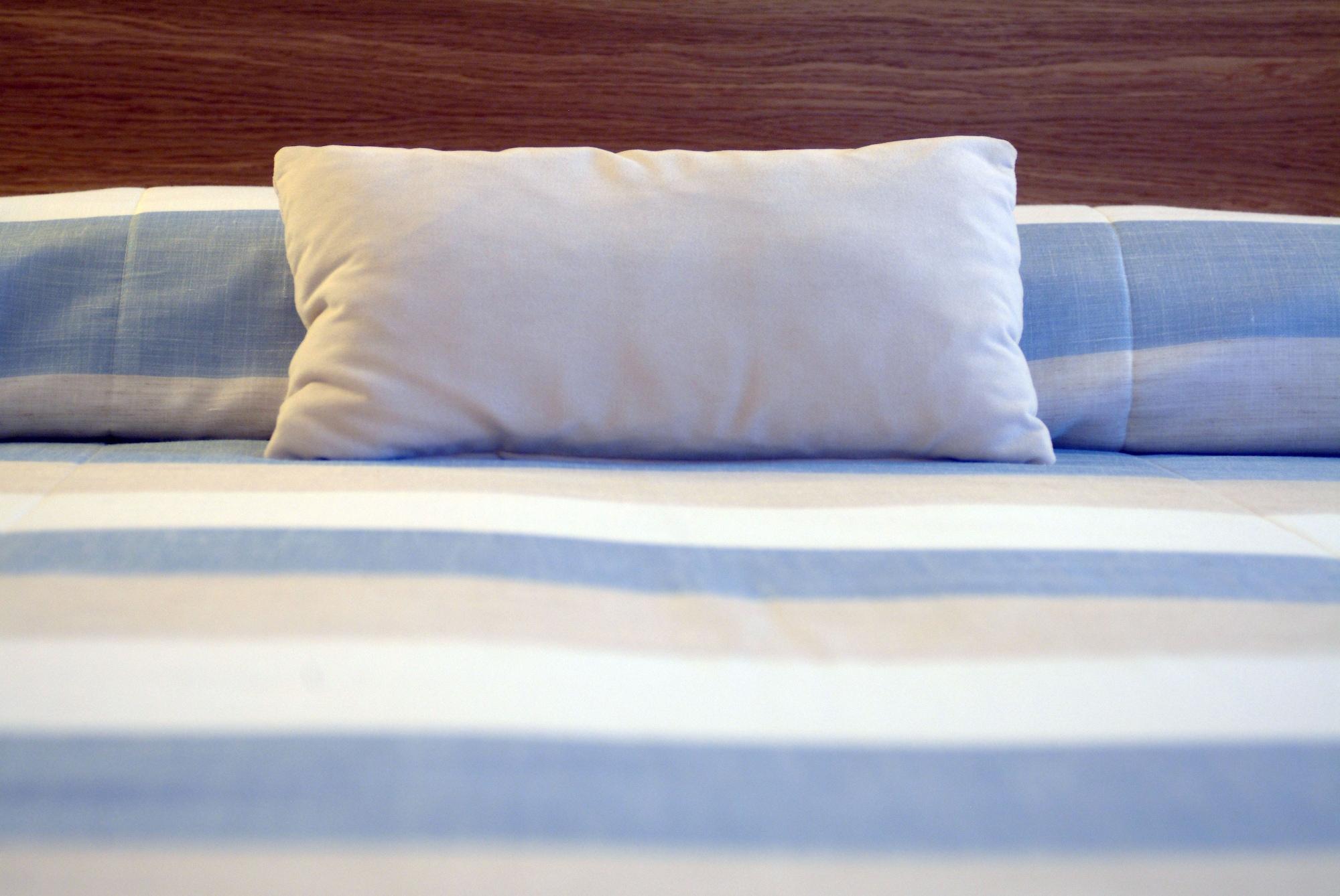 Pestana Casino Park Hotel&Casino Funchal  Esterno foto A pillow on a bed